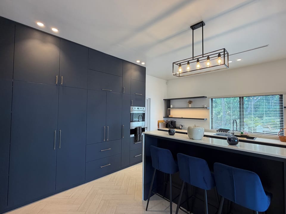 Modern appliances and generous workspace make dining in simple and enjoyable 