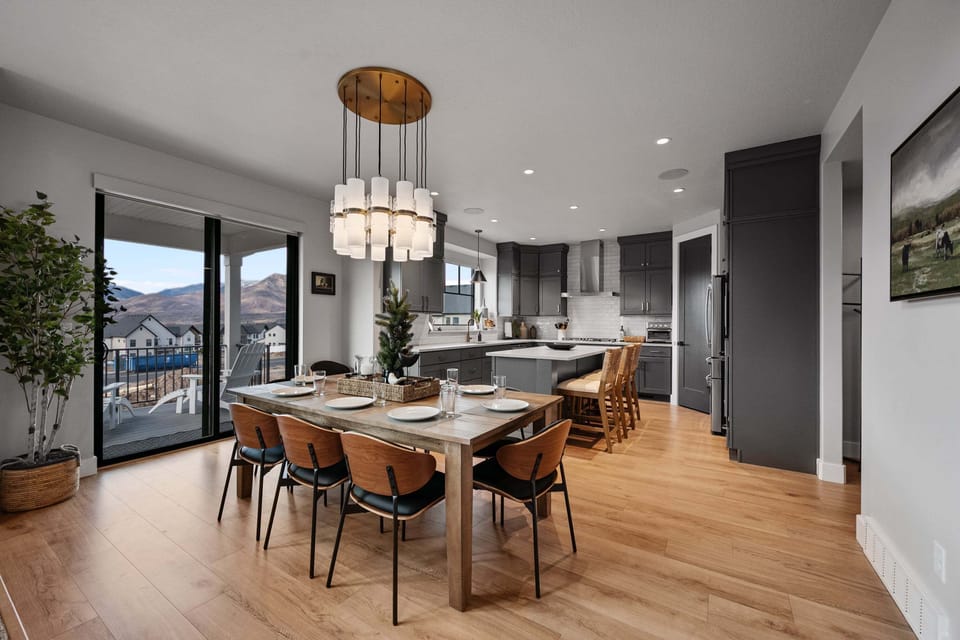 The Vista dining table can expand to seat 13 plus bar seating for an additional 3 plus outdoor seating on the deck area