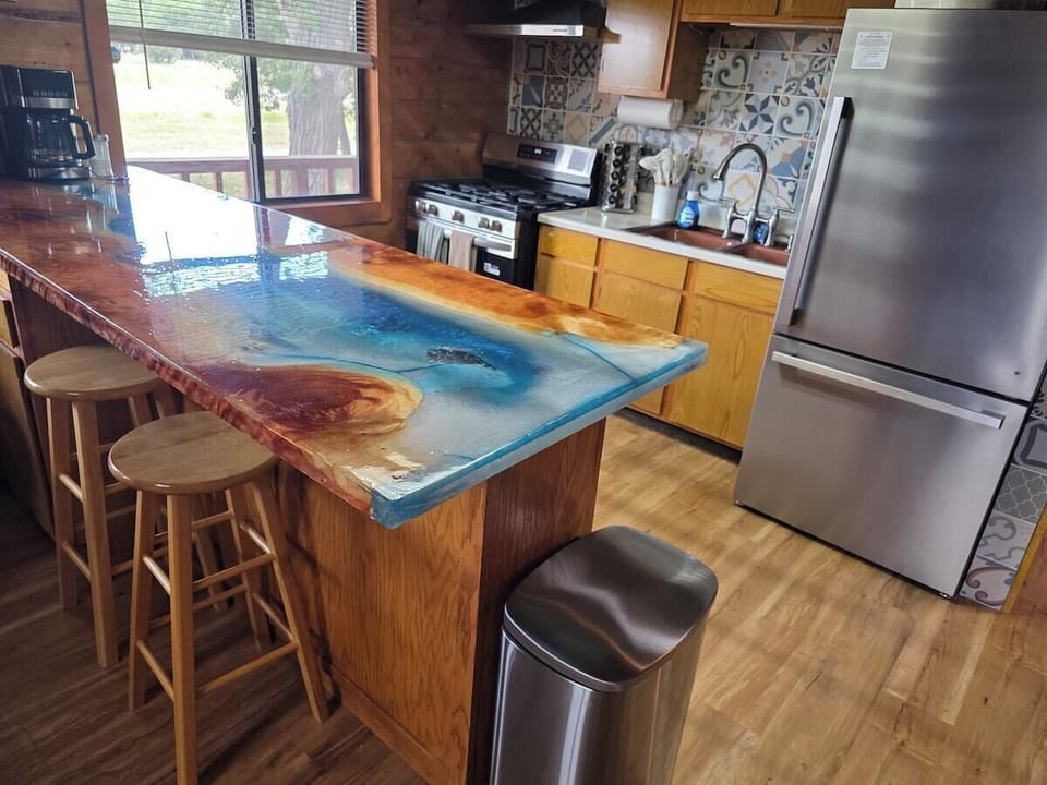 Gas range with vent hood.