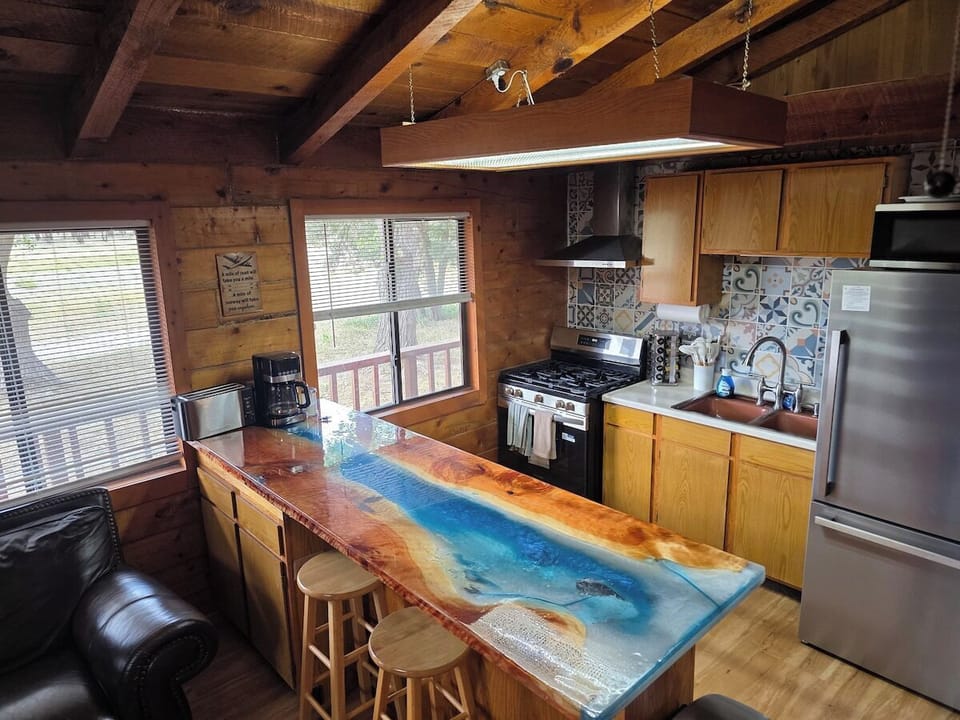 One-of-a-kind epoxy river breakfast bar.