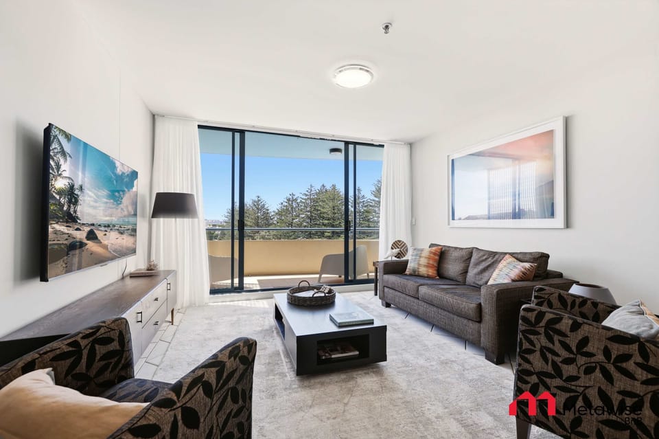 Bright living room with balcony access
