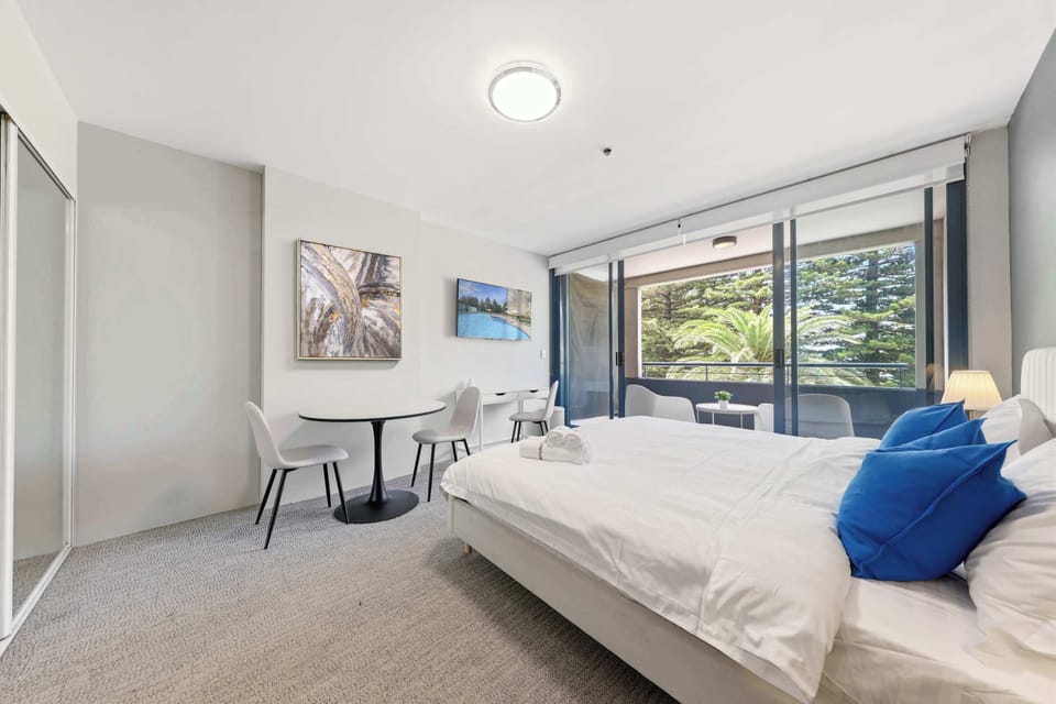 Spacious bedroom with balcony access