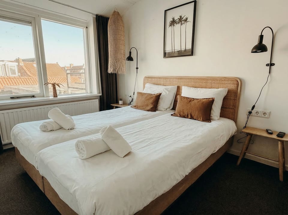 Enjoy restful nights in this charming Holiday home Zeeland with flexible bed setup.
