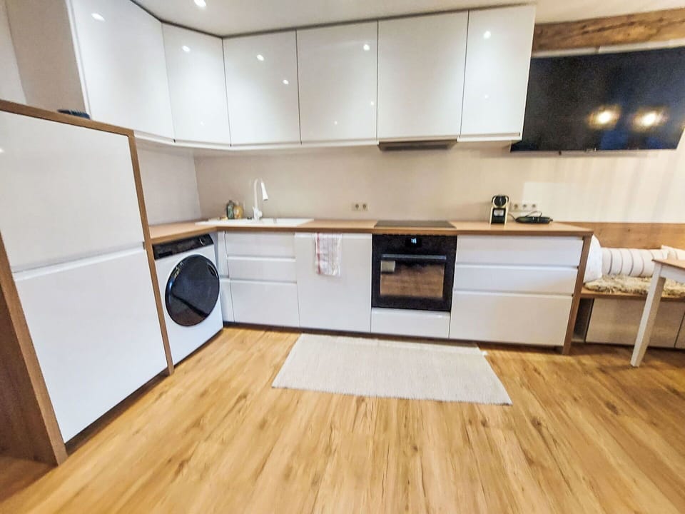 Flooring, Floor, Wood, Interior Design, Wood Flooring, Major Appliance, Cabinetry, Kitchen, Furniture, Countertop