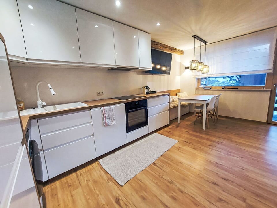 Countertop, Kitchen, Flooring, Interior Design, Furniture, Wood, Kitchen Appliance, Floor, Cabinetry, Wood Flooring