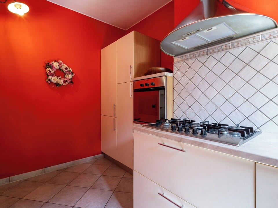 Flooring, Kitchen, Interior Design, Major Appliance, Floor, Room, Kitchen Appliance, Countertop, Home, Kitchen Stove