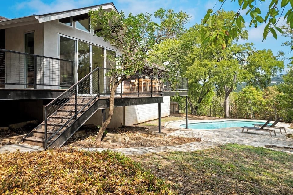 Private Fenced in Backyard with Deck, grill, pool and outside  furniture.