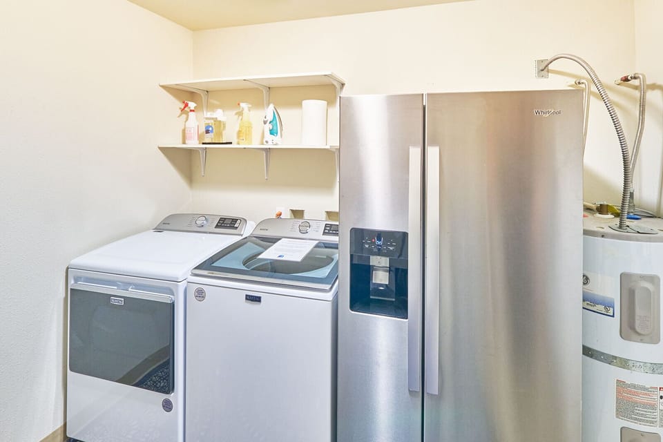 Full-size washer and dryer in the laundry room, plus a spare refrigerator for your goodies (laundry soap provided)