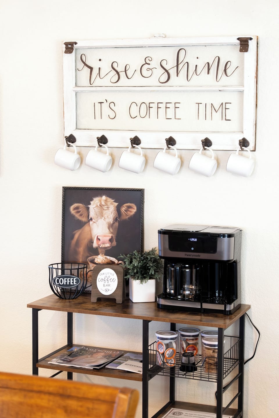 Simple coffee bar with mugs and jars within reach