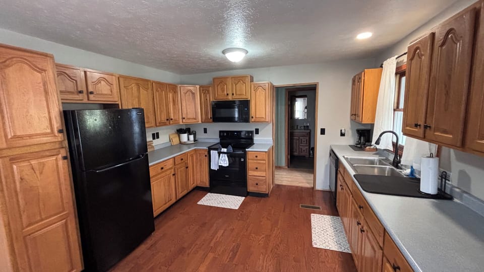 Large new kitchen, fully equipped for home-cooked meals & comfort.