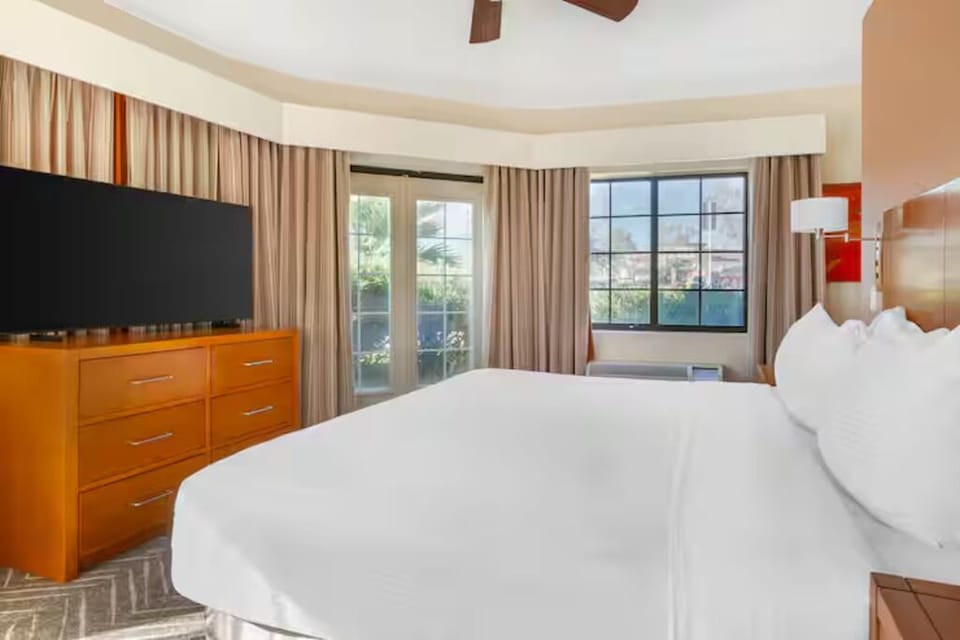 Wake up to natural light and a peaceful, spacious room.