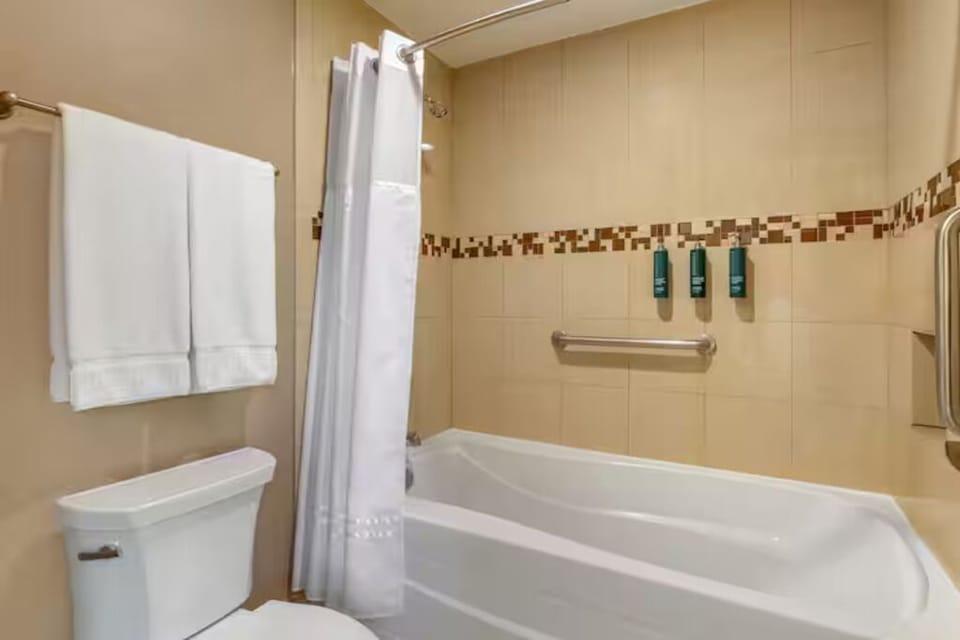 Refresh after a long day with a clean tub-shower combo.
