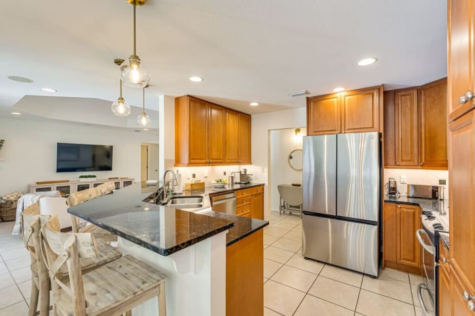 Kitchen | Granite Counters, Stainless Appliances & Breakfast Bar