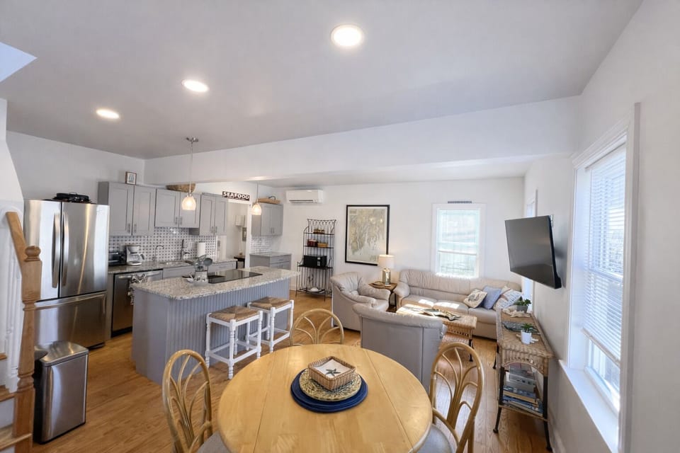 Open dining/ kitchen/ living area.