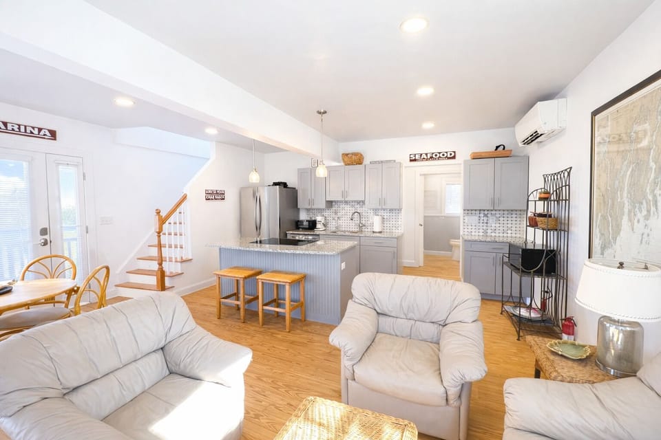 Inside is the open dining/ living/ kitchen area.