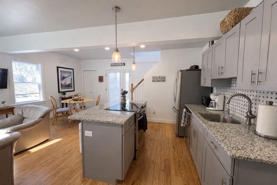 Open dining/ kitchen/ living area.