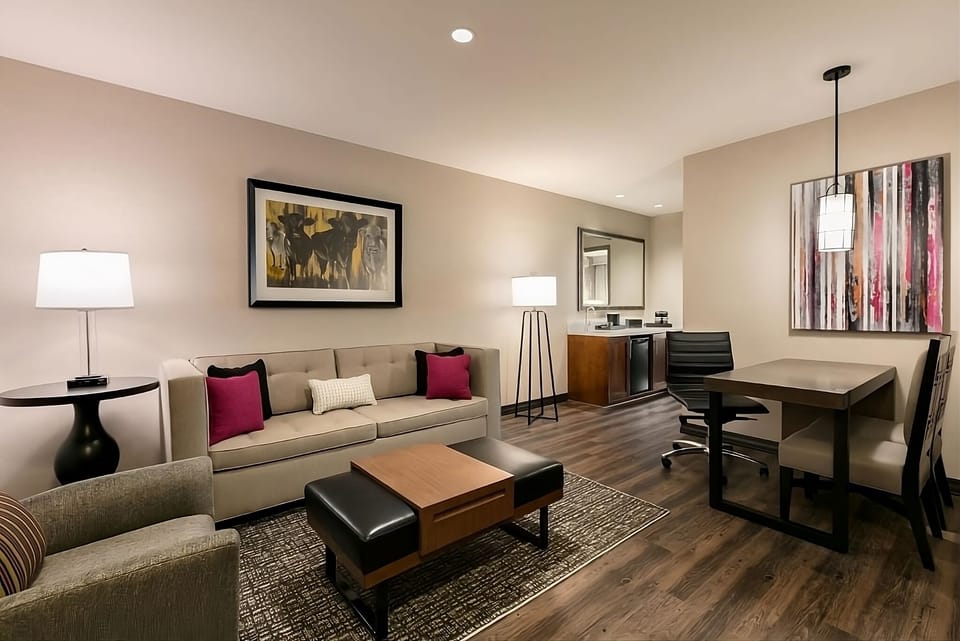 Gather comfortably in the stylish lounge with warm lighting.