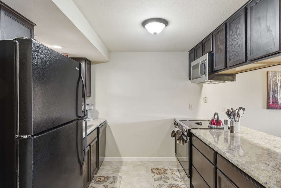 The cozy kitchen is well equipped for an unforgettable getaway​