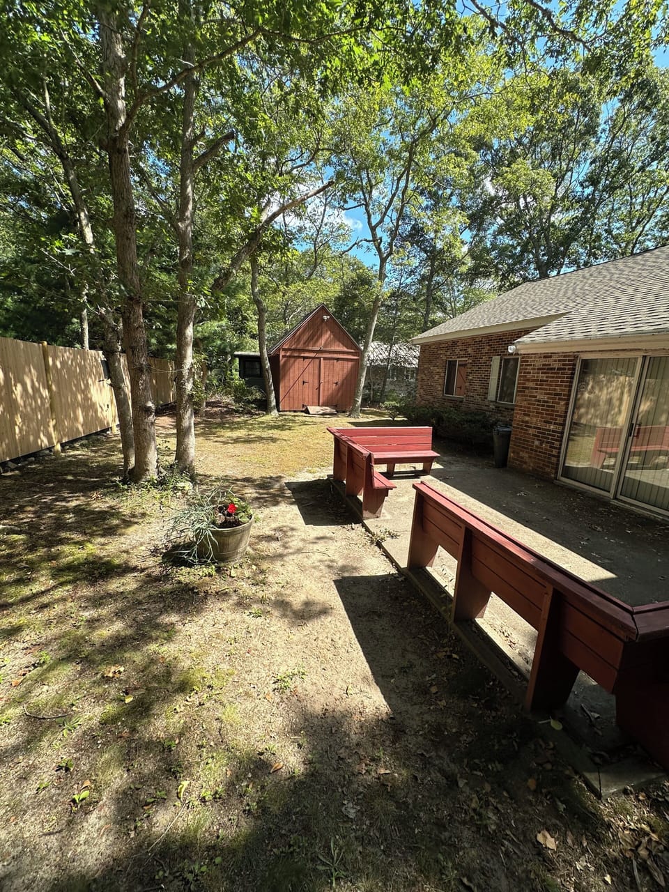 Back Yard with Picnic Table and Gas Grill in season