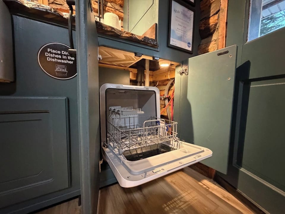 Dishwasher in cabinet. 