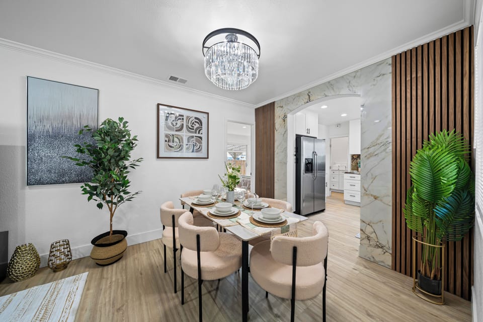 Elegant dining area featuring a stunning chandelier. Perfect for memorable meals