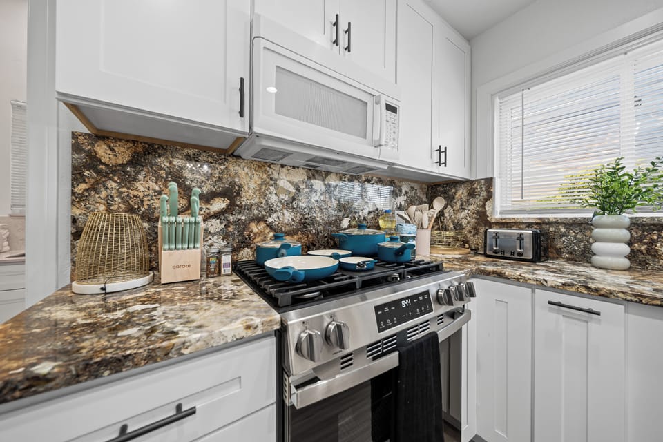 Kitchen equipped with pans — ready for all your cooking needs.