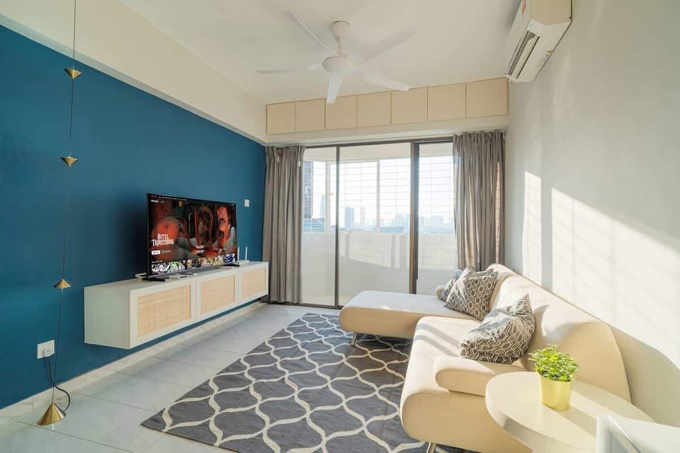 A cozy living area with a Smart TV with SVI Cloud TV Box 小云电视盒 (access to varies of dramas, movies)