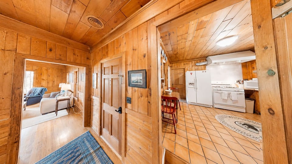 VIew of living area and kitchen area.