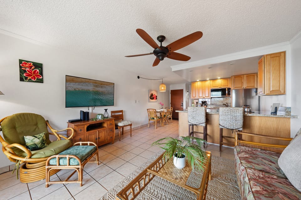Bright space with bar seating and comfortable living area.
