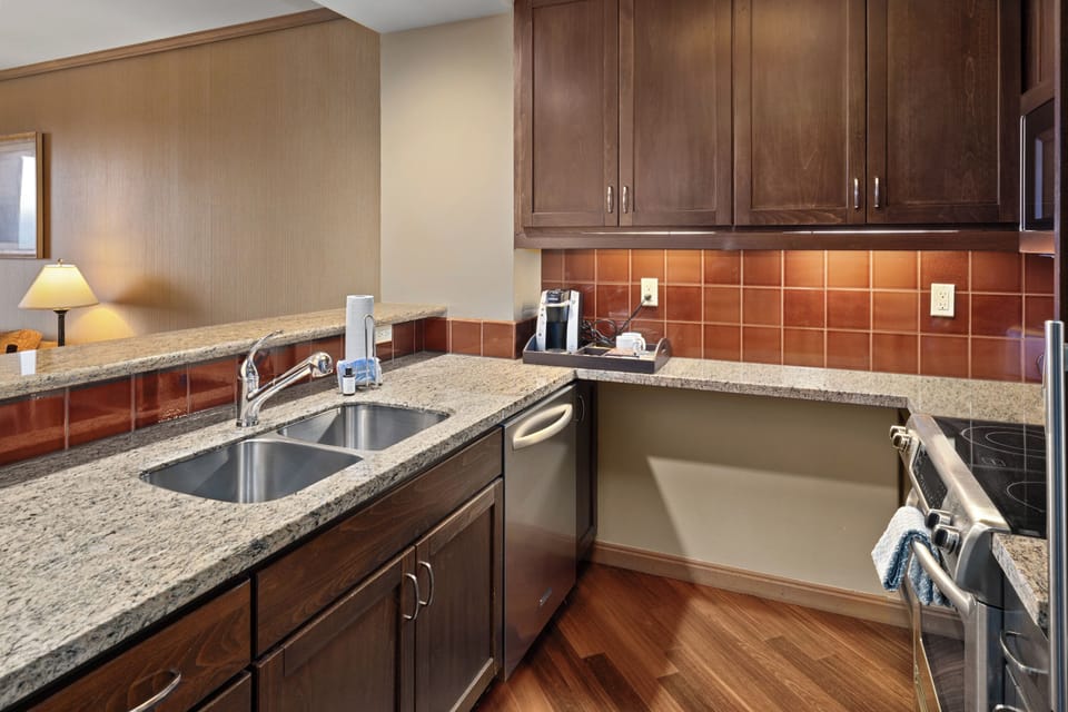 A convenient secondary kitchen view highlights ample counter space, modern appliances, and thoughtful design, ensuring everything you need for a comfortable stay is within reach.