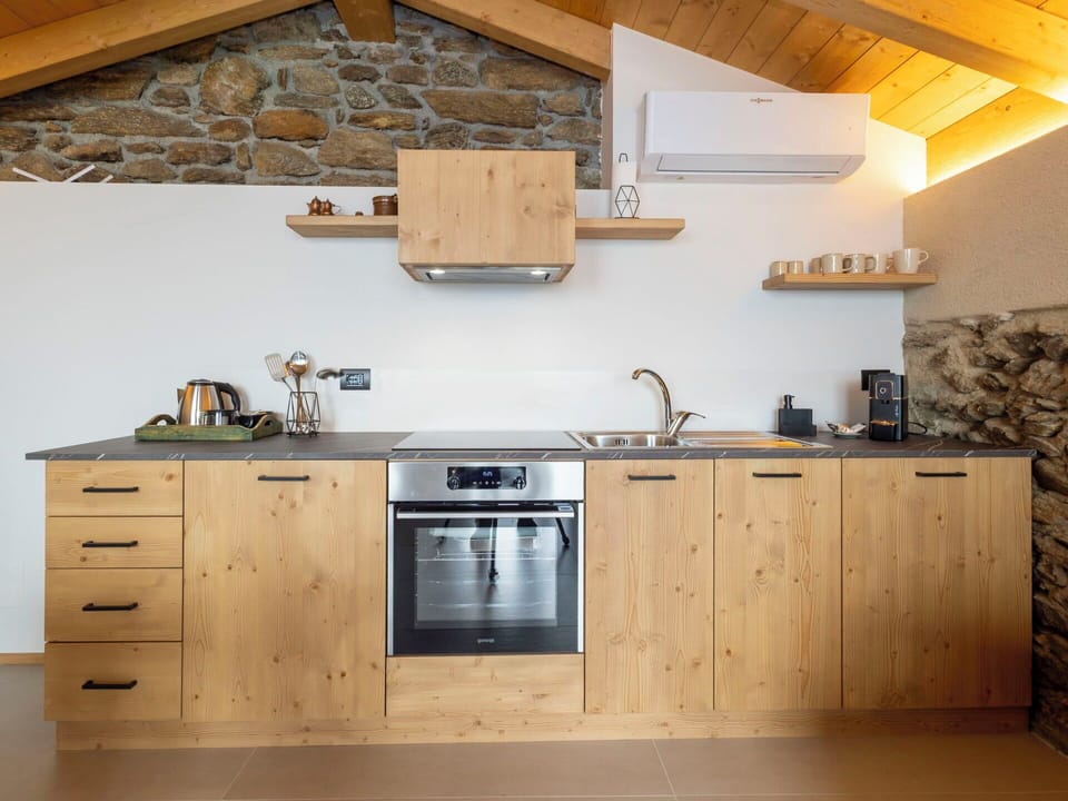 Wood, Kitchen, Furniture, Interior Design, Cabinetry, Countertop, Flooring, Ceiling, Plumbing Fixture, Kitchen Appliance
