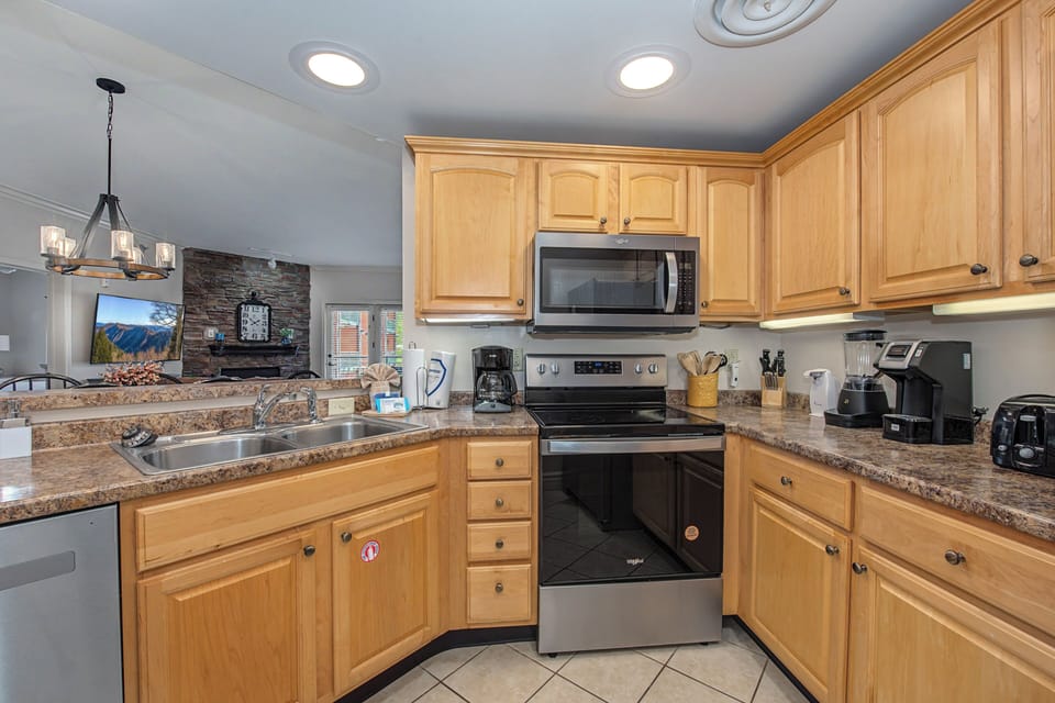 Your fully equipped kitchen awaits with granite counters, stainless appliances, and everything you need to create memorable meals during your stay.