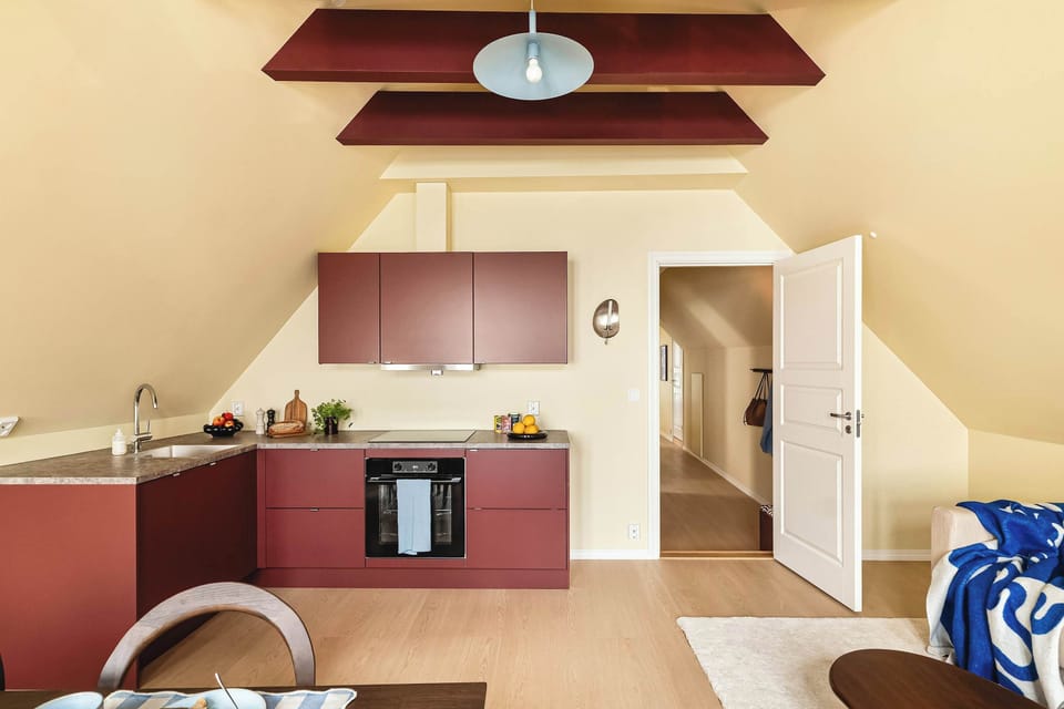 Bright open-plan kitchen and living area designed for comfort and social gatherings.