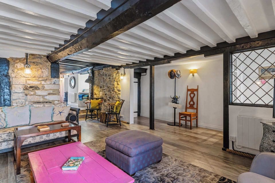 Snuggle up in this unique space with original stone walls and a homely atmosphere