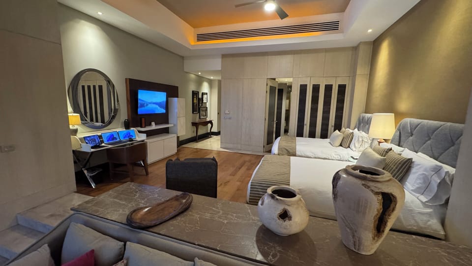 Two plush beds and an open sleeping area designed for comfort