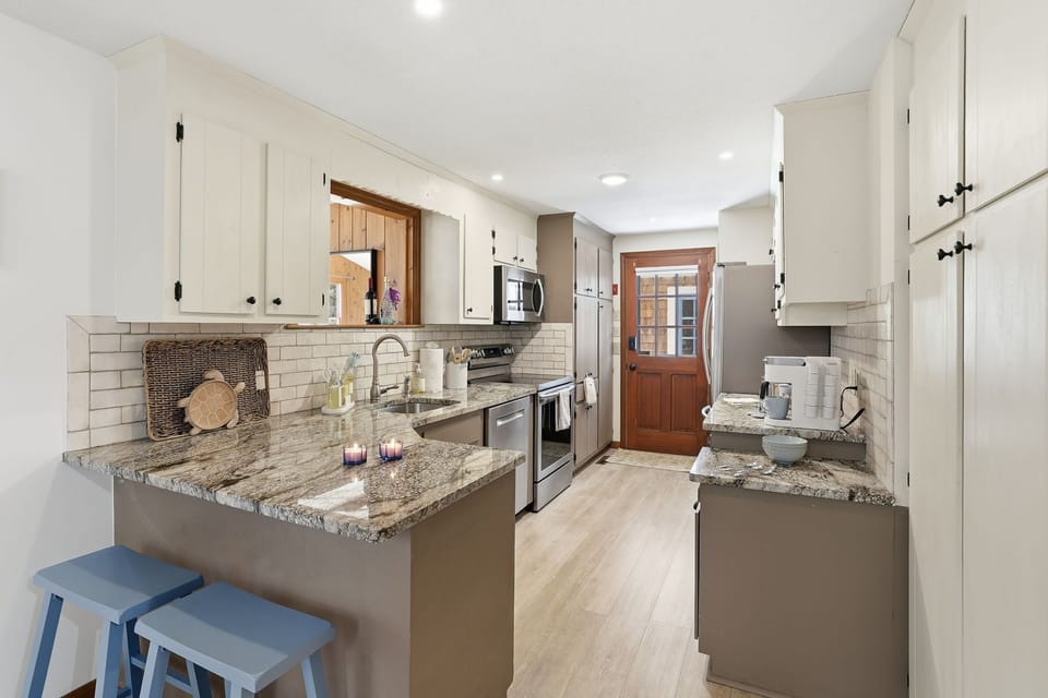 Morning brews and gourmet views. A bright, polished space for your inner chef.