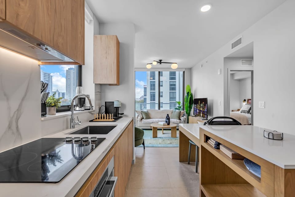 Chef’s dream in the city! 🍳✨ This sleek kitchen features custom Italian cabinetry, high-end Bosch appliances, and a stylish island with seating perfect for entertaining or a quiet breakfast in.