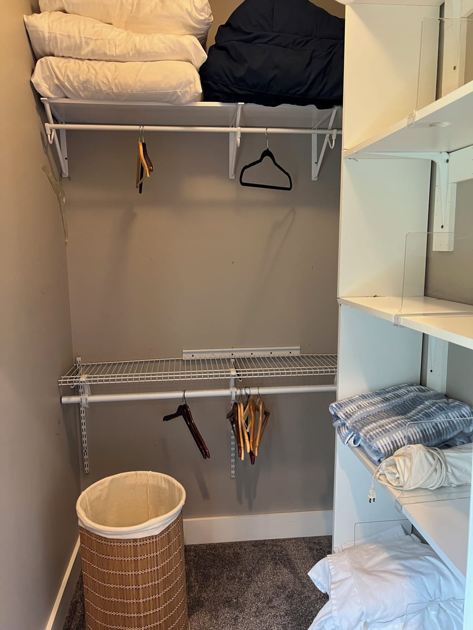 Walk in closet extra blanket and pillows.