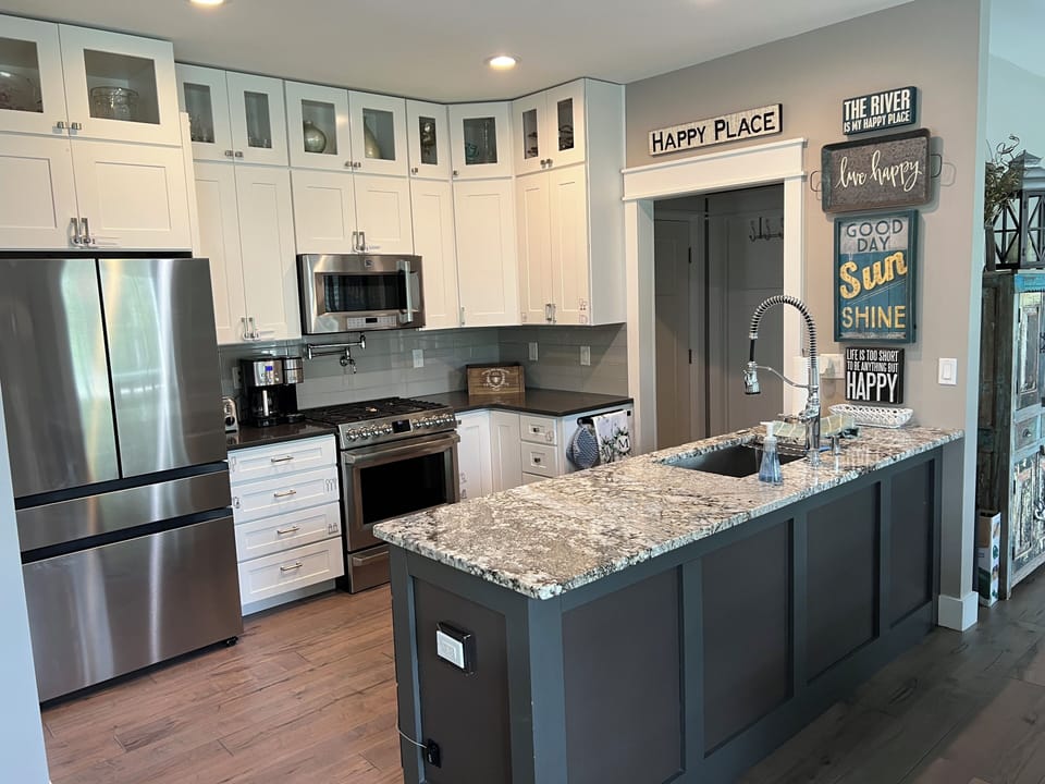 Kitchen, refrigerator has filter water and filter water pitcher on left side 