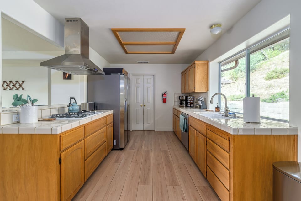 Enjoy a fully stocked kitchen for feeling at home. Complementary coffee and tea.
