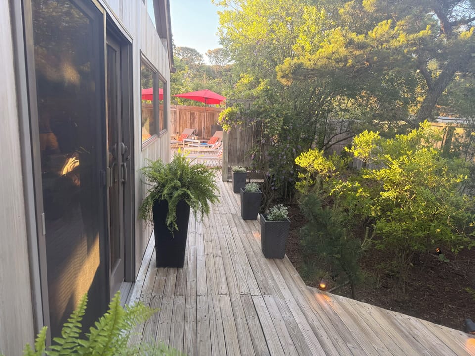 View from the front of the house looking towards the pool/spa deck.