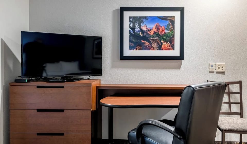 Settle in with a roomy desk and easy in-room entertainment.