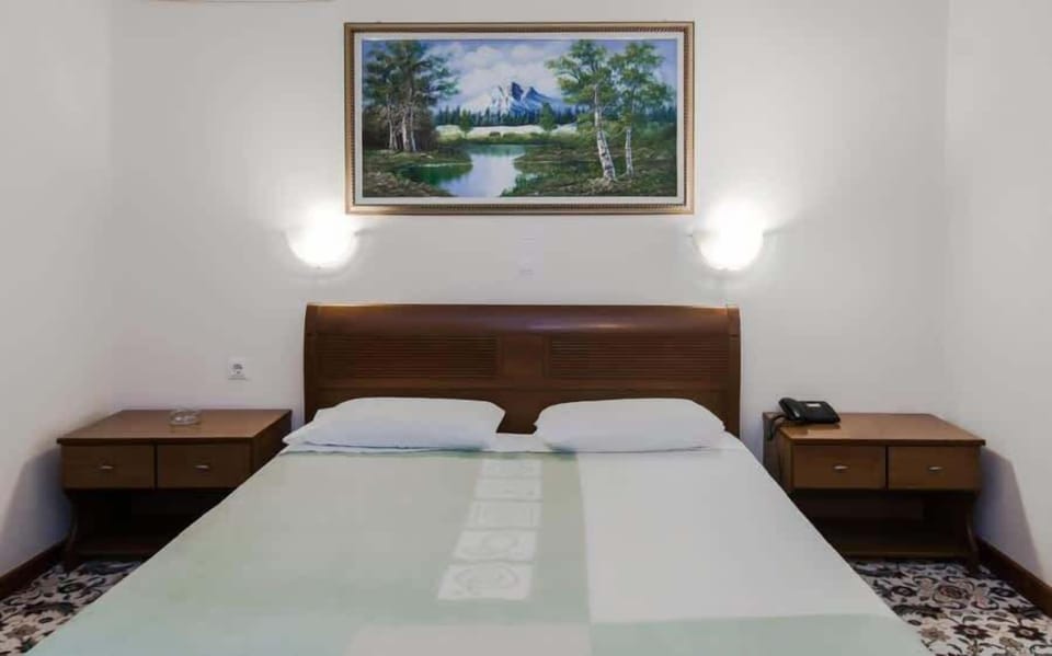 Classic double rooms have a double/double plus single bed configuration