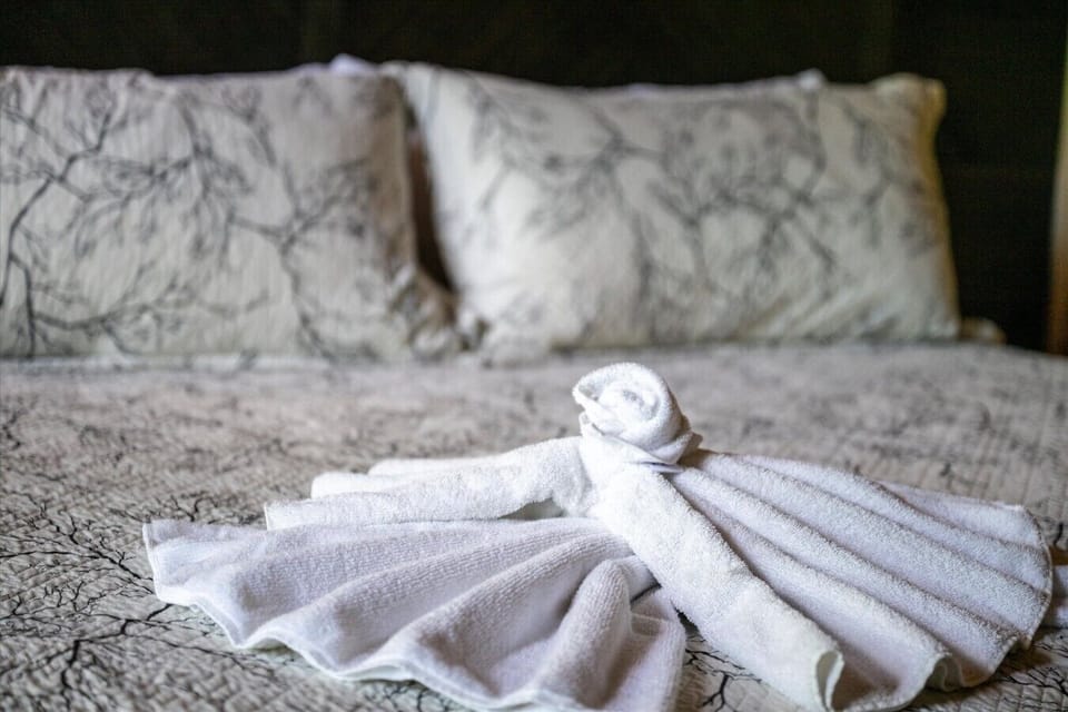 Natural wood accents and calming décor make this bedroom an ideal place to recharge between adventures.