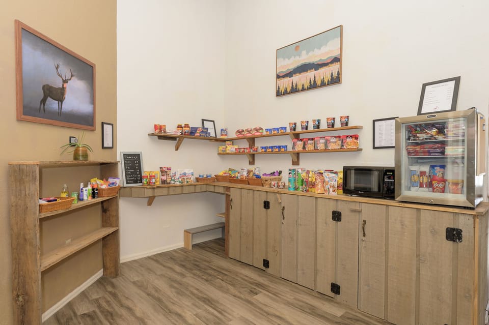 Grab snacks and drinks from this convenient on-site market, featuring a microwave for your quick meals and refrigerated selections.