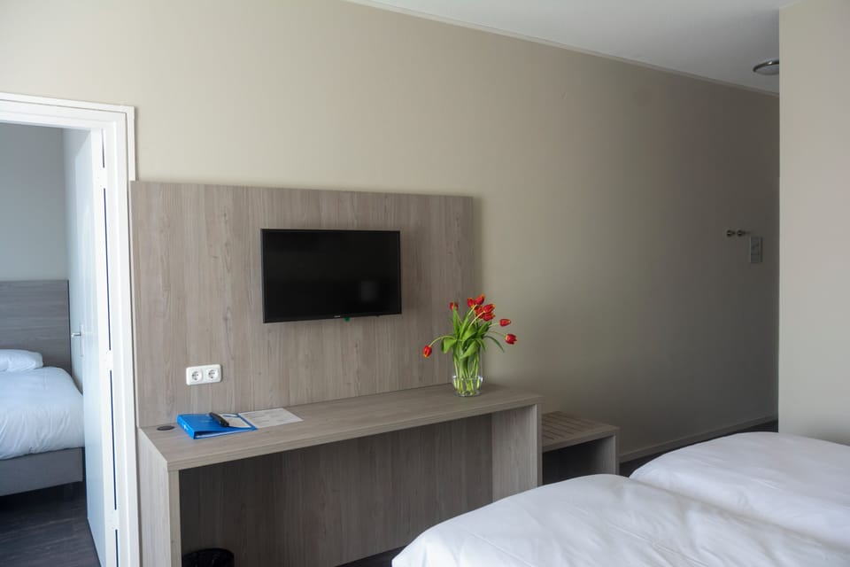 Settle in with a spacious desk and easy TV viewing.