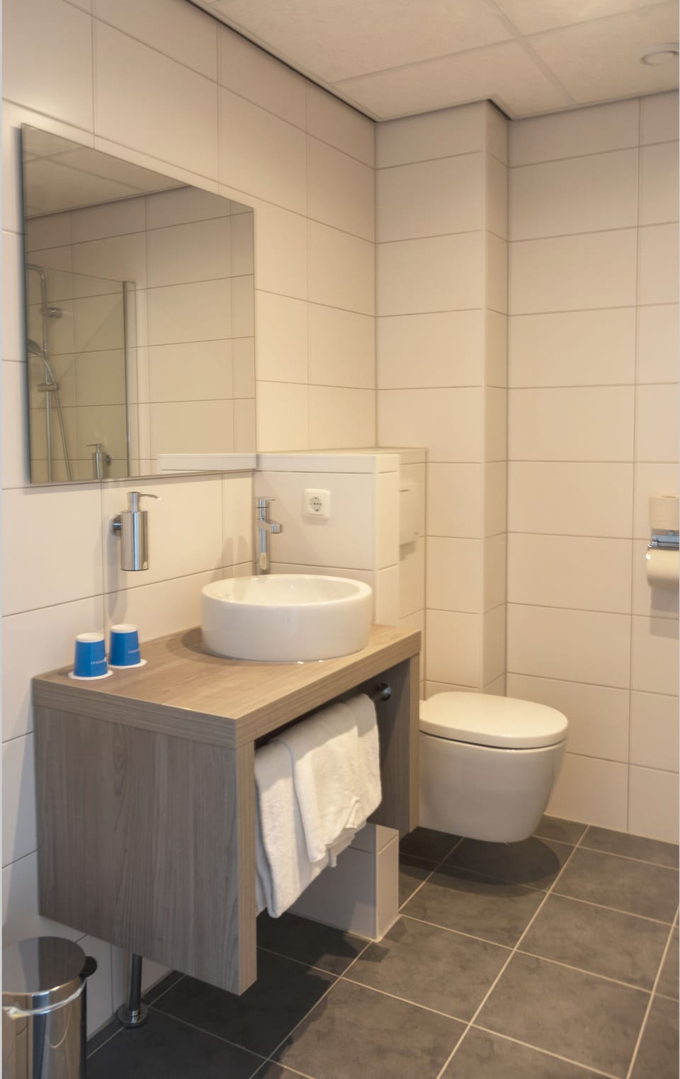 Recharge in a spotless bathroom with roomy shower comfort.