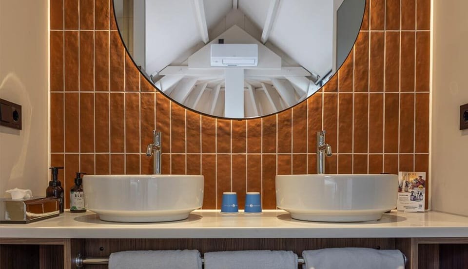 Get ready together with double sinks and flattering mirror light.