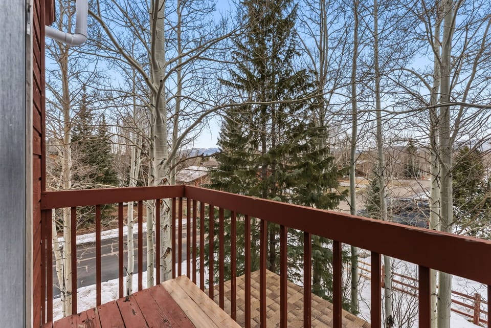Step onto your private balcony and breathe in the crisp mountain air while taking in peaceful treetop views.