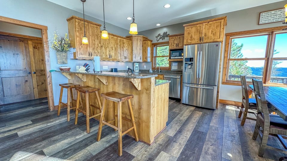 The kitchen has stainless steel appliances and granite countertops so you can prepare meals in luxury.